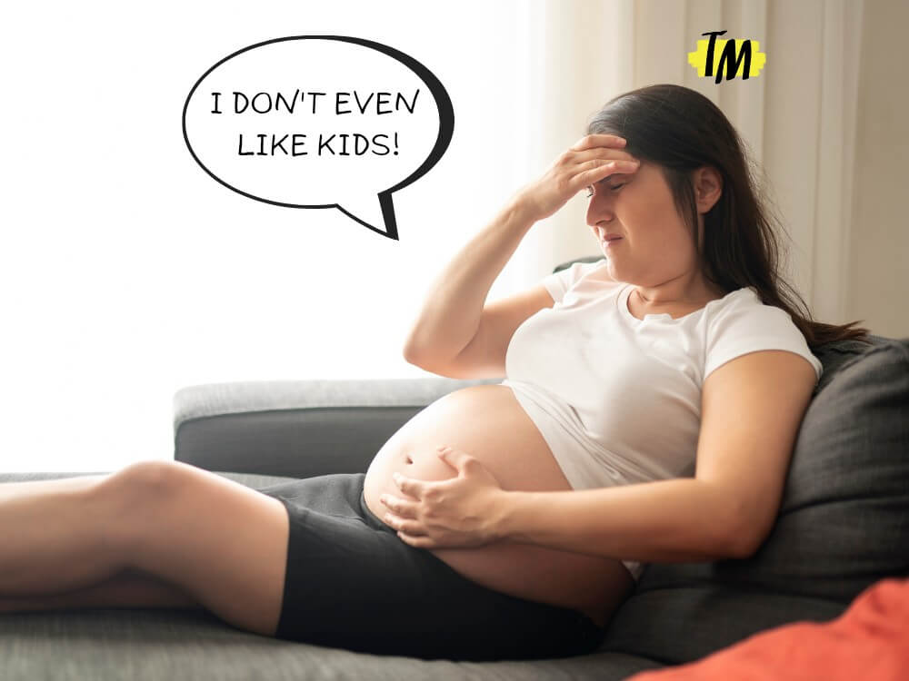 Pregnant woman on the couch with a thought bubble that says - I don't even like kids!