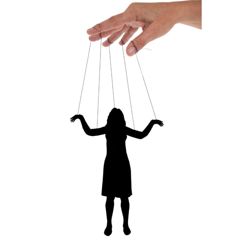 Hand holding the strings of a person as if they were a puppet.